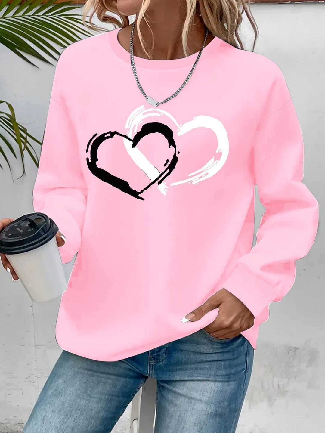 ZOEY – DUBBELE HART GRAFISCHE SWEATSHIRT