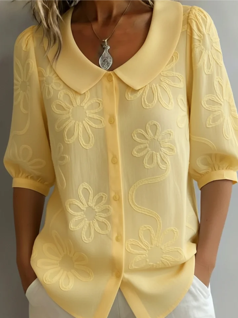 Elegante blouse met korte mouwen en bloemen decor