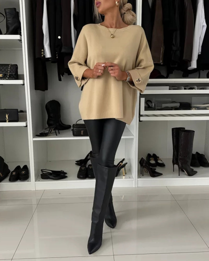 CLAIRE – ELEGANTE RELAXTE TRUI MET KNOOPMANCHETTEN