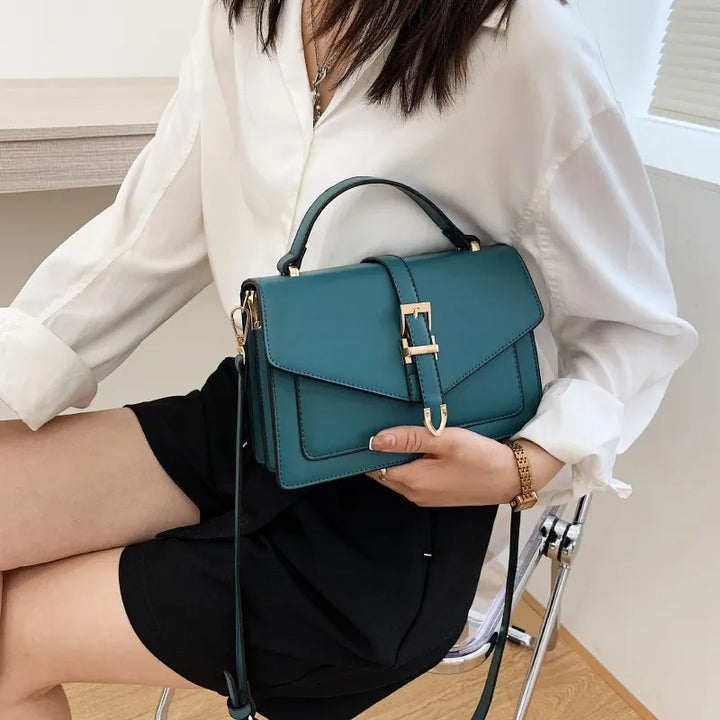 Sorel | Dameshandtas met klepsluiting en schouderriem
