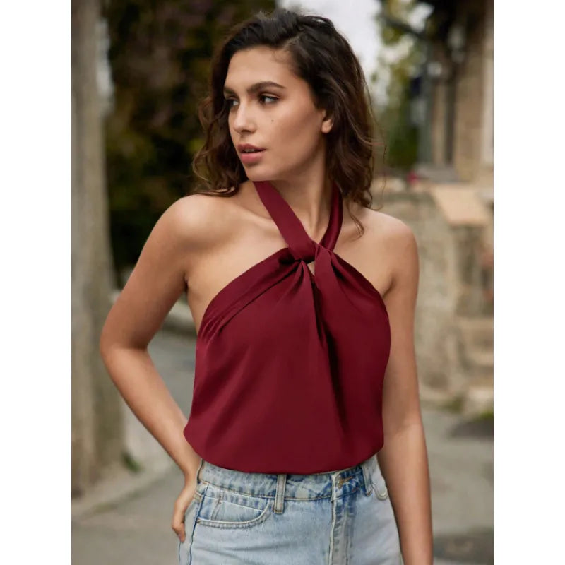Bria | Dames haltertop met knoopdetail en plooien
