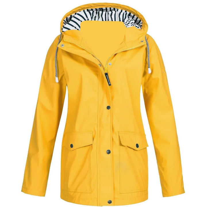 Zoey | Dames regenjas met capuchon en klepzakken