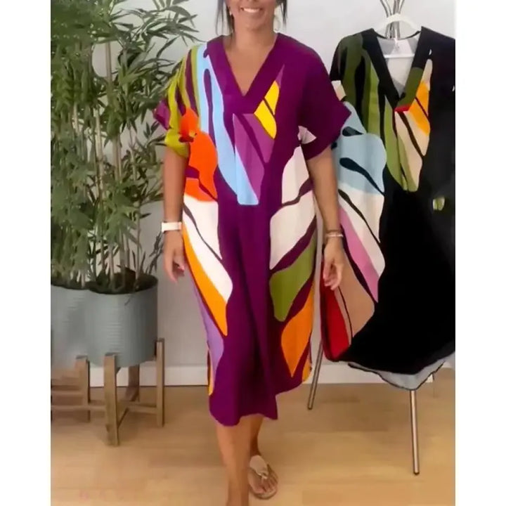 Nora |  Damesjurk met V-hals en abstract patroon