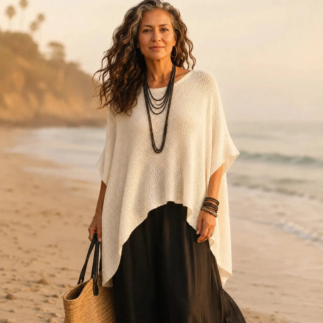 Solvera – Open Gebreide Batwing Top met Asymmetrische Zoom