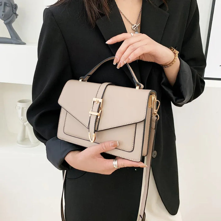 Sorel | Dameshandtas met klepsluiting en schouderriem