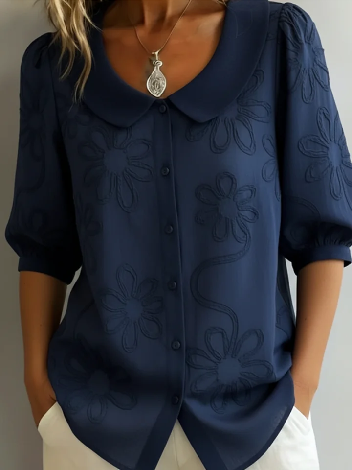 Elegante blouse met korte mouwen en bloemen decor