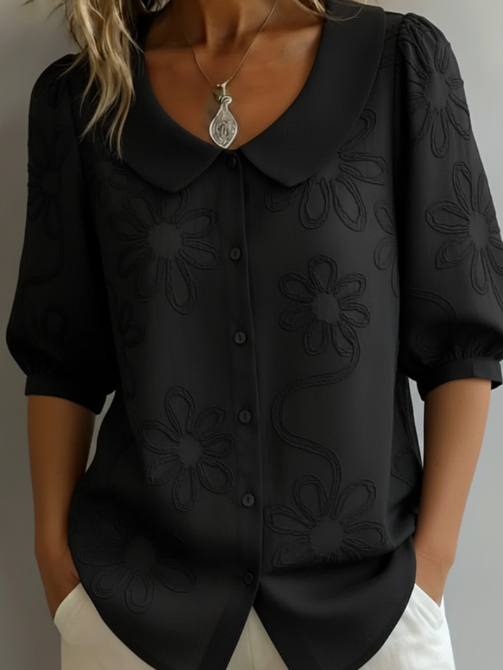 Elegante blouse met korte mouwen en bloemen decor
